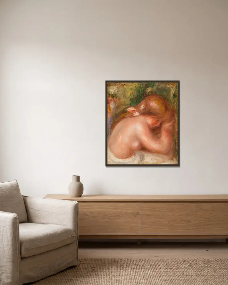 Nude Torso of Young Girl (Torse nu de jeune fille) av Pierre-Auguste Renoir inramad på en vägg