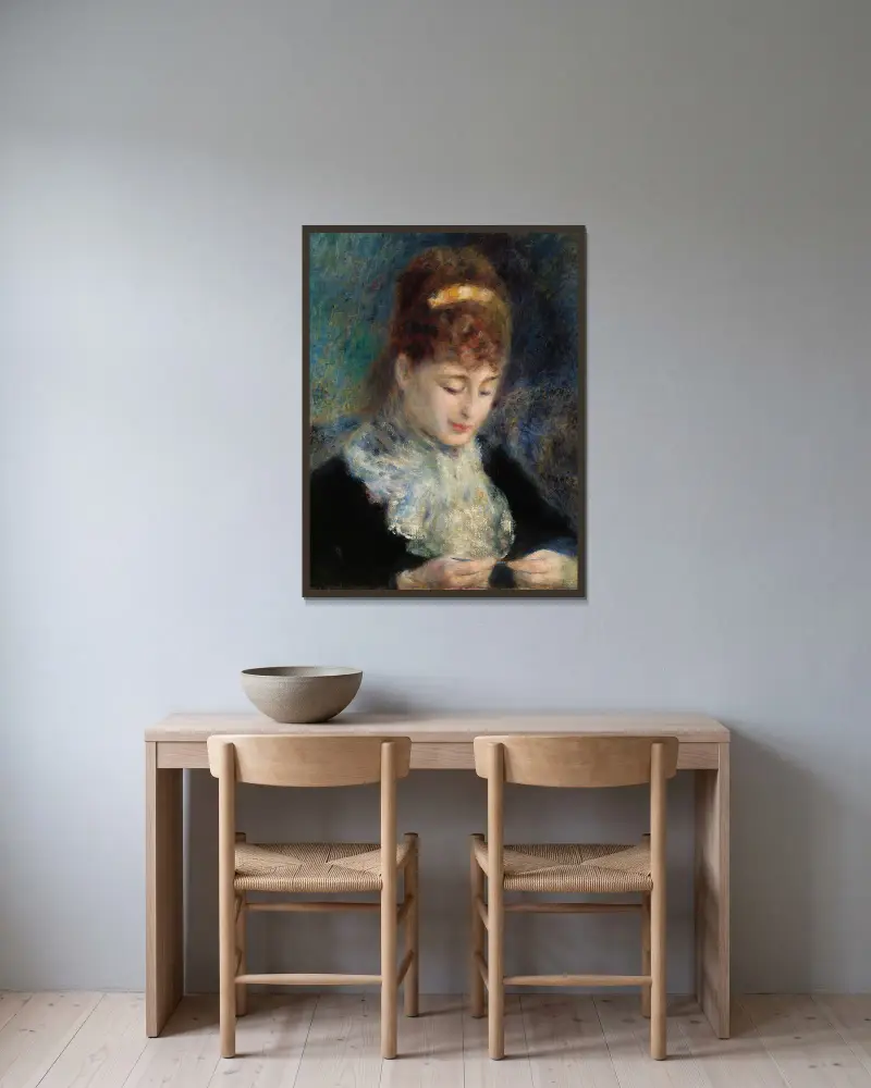 Woman Crocheting (Femme faisant du crochet) av Pierre-Auguste Renoir inramad på en vägg