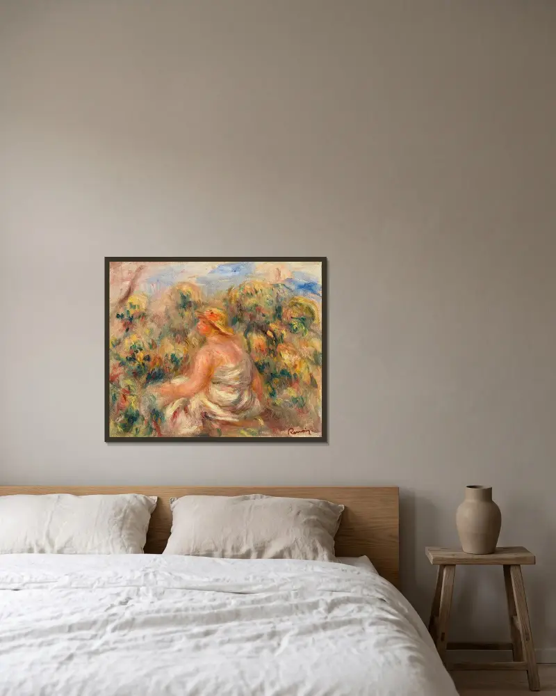 Woman with Hat in a Landscape (Femme avec chapeau dans un paysage) av Pierre-Auguste Renoir inramad på en vägg