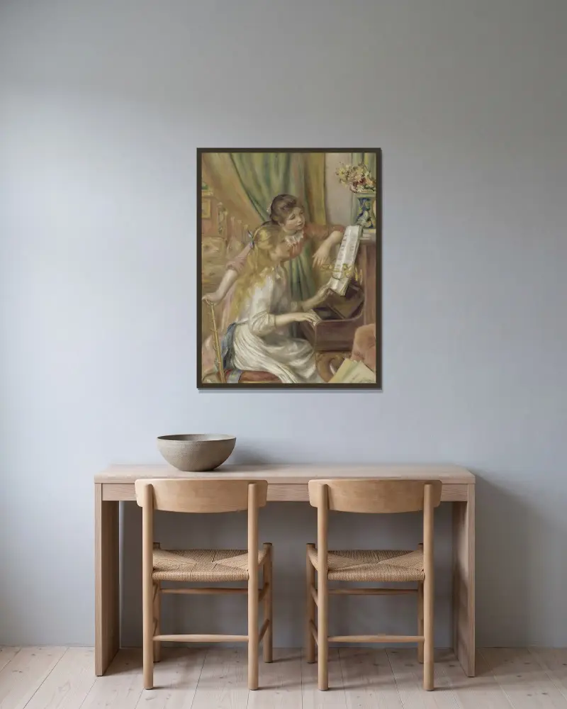 Junge Mädchen am Klavier von Pierre-Auguste Renoir gerahmt an einer Wand