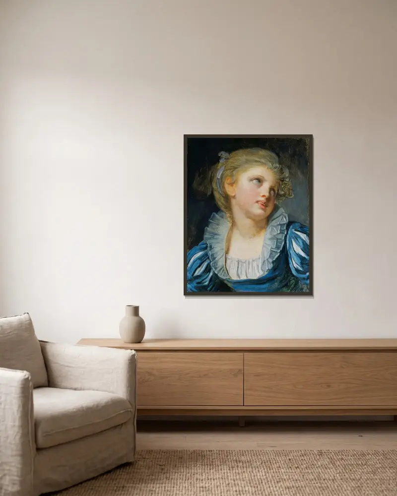 Flicka i blå klänning av Jean-Baptiste Greuze inramad på en vägg
