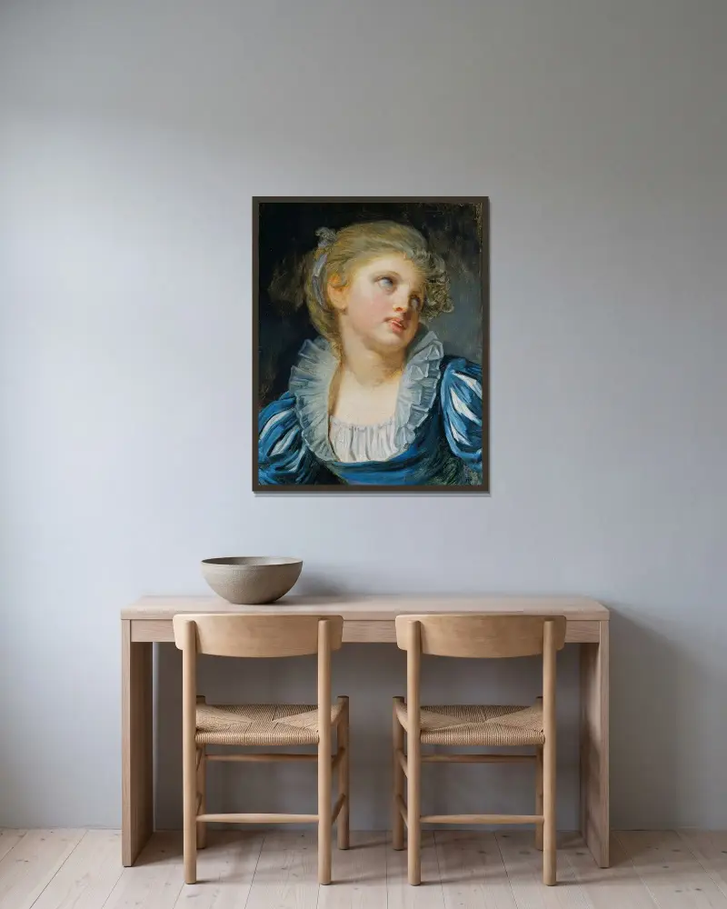 Flicka i blå klänning av Jean-Baptiste Greuze inramad på en vägg