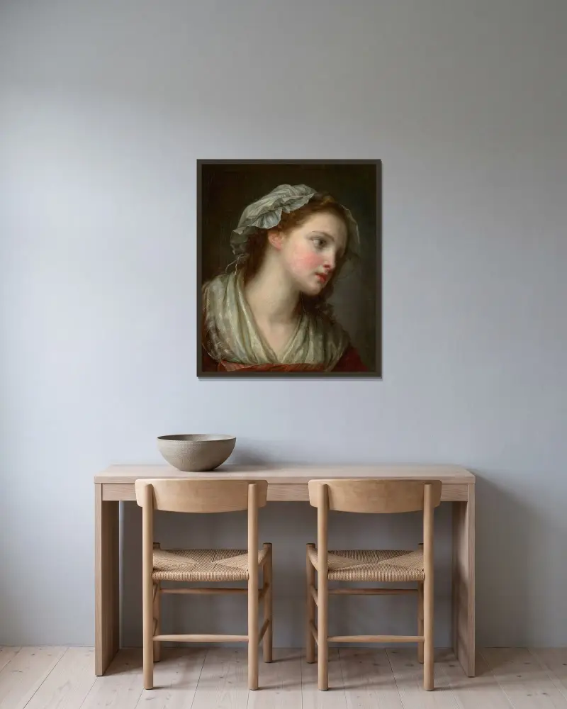 Flicka med mössa av Jean-Baptiste Greuze inramad på en vägg