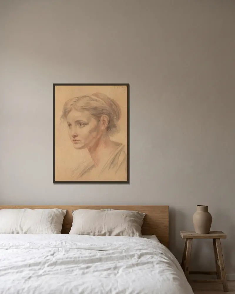 Flickhuvud av Jean-Baptiste Greuze inramad på en vägg