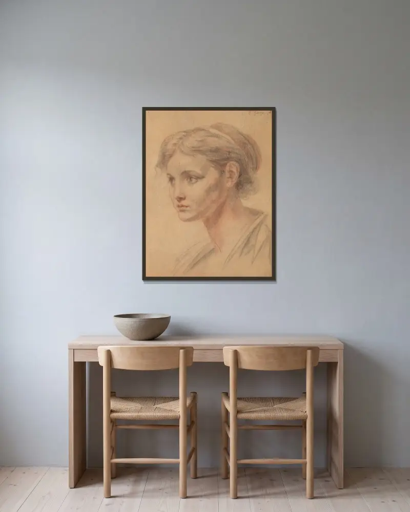 Flickhuvud av Jean-Baptiste Greuze inramad på en vägg