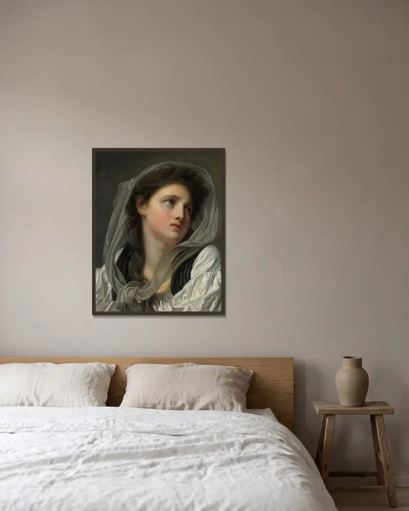 Ung kvinnas huvud av Jean-Baptiste Greuze inramad på en vägg