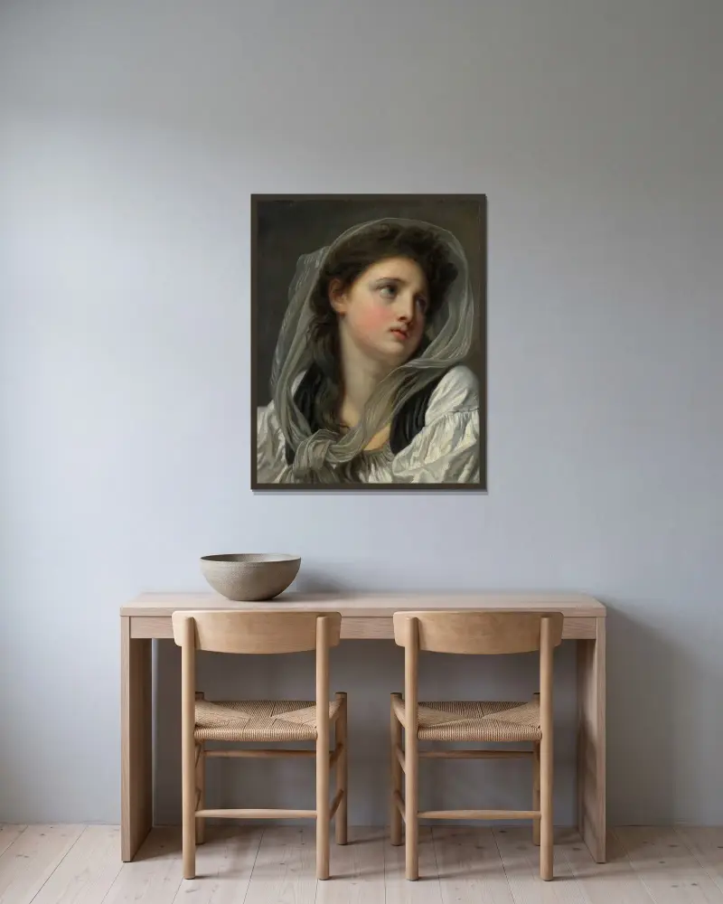 Ung kvinnas huvud av Jean-Baptiste Greuze inramad på en vägg