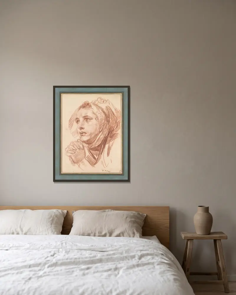 Huvud av en ung kvinna av Jean-Baptiste Greuze inramad på en vägg