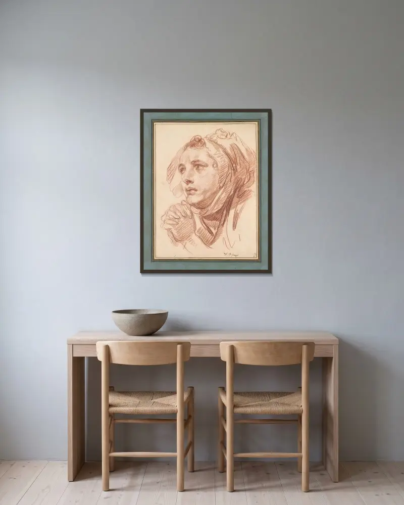 Huvud av en ung kvinna av Jean-Baptiste Greuze inramad på en vägg