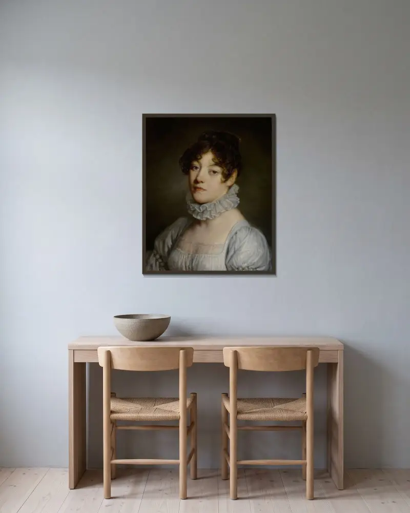 Porträtt av en ung kvinna av Jean-Baptiste Greuze inramad på en vägg