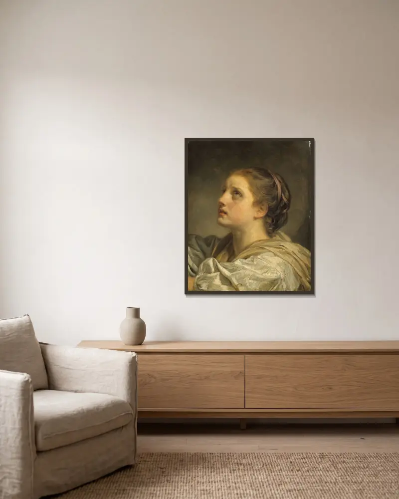 Ung kvinnas huvud av Jean-Baptiste Greuze inramad på en vägg
