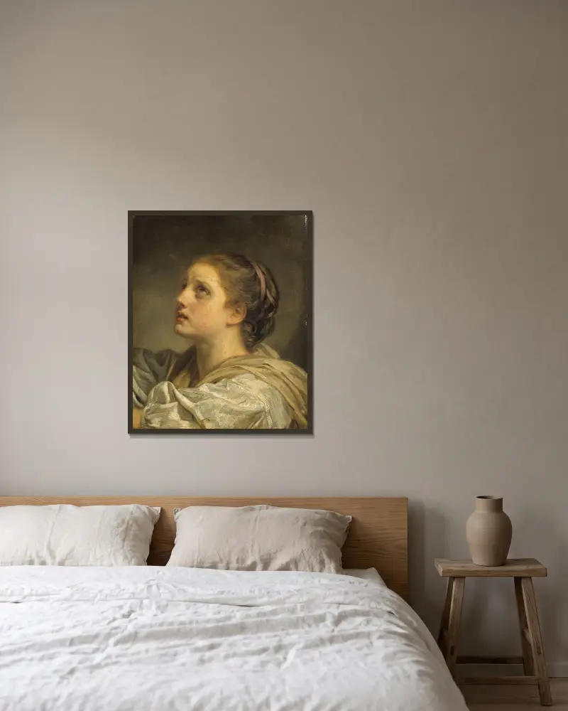 Ung kvinnas huvud av Jean-Baptiste Greuze inramad på en vägg