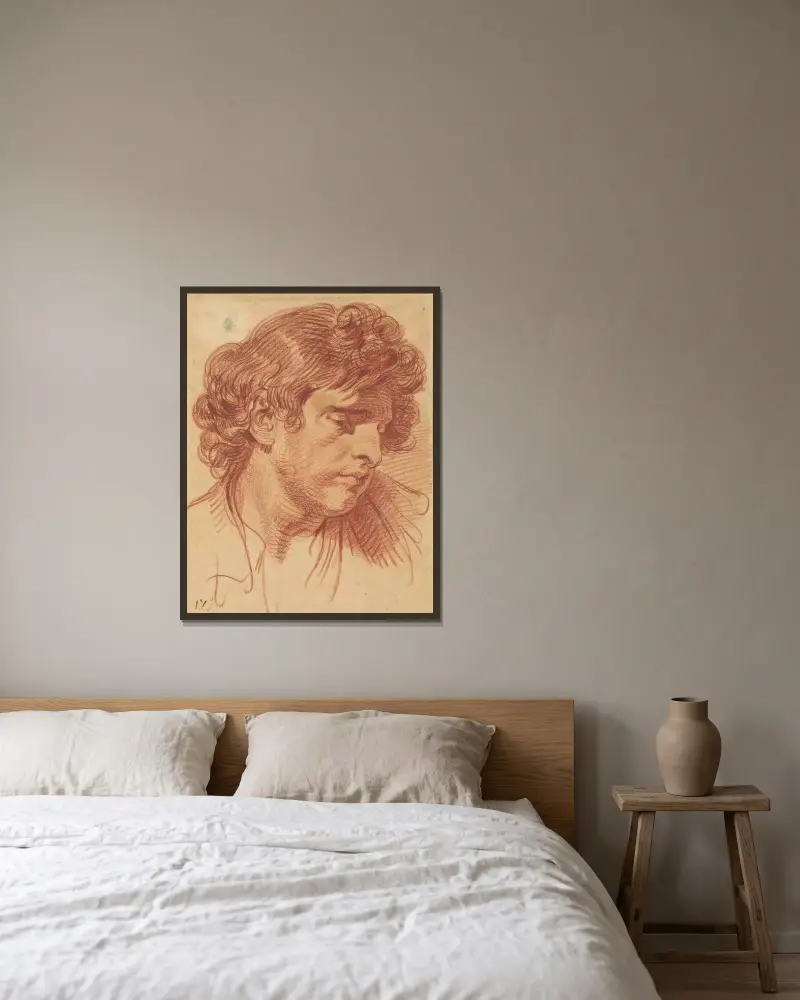 Manshuvud med lockigt hår av Jean-Baptiste Greuze inramad på en vägg