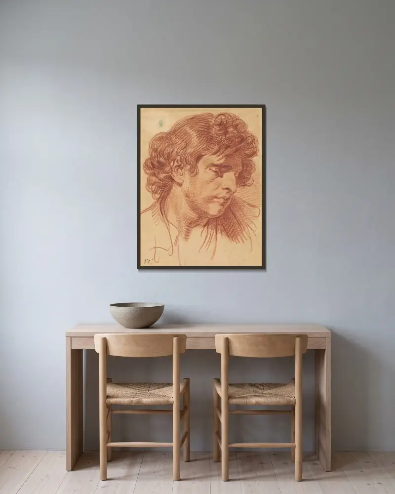 Manshuvud med lockigt hår av Jean-Baptiste Greuze inramad på en vägg