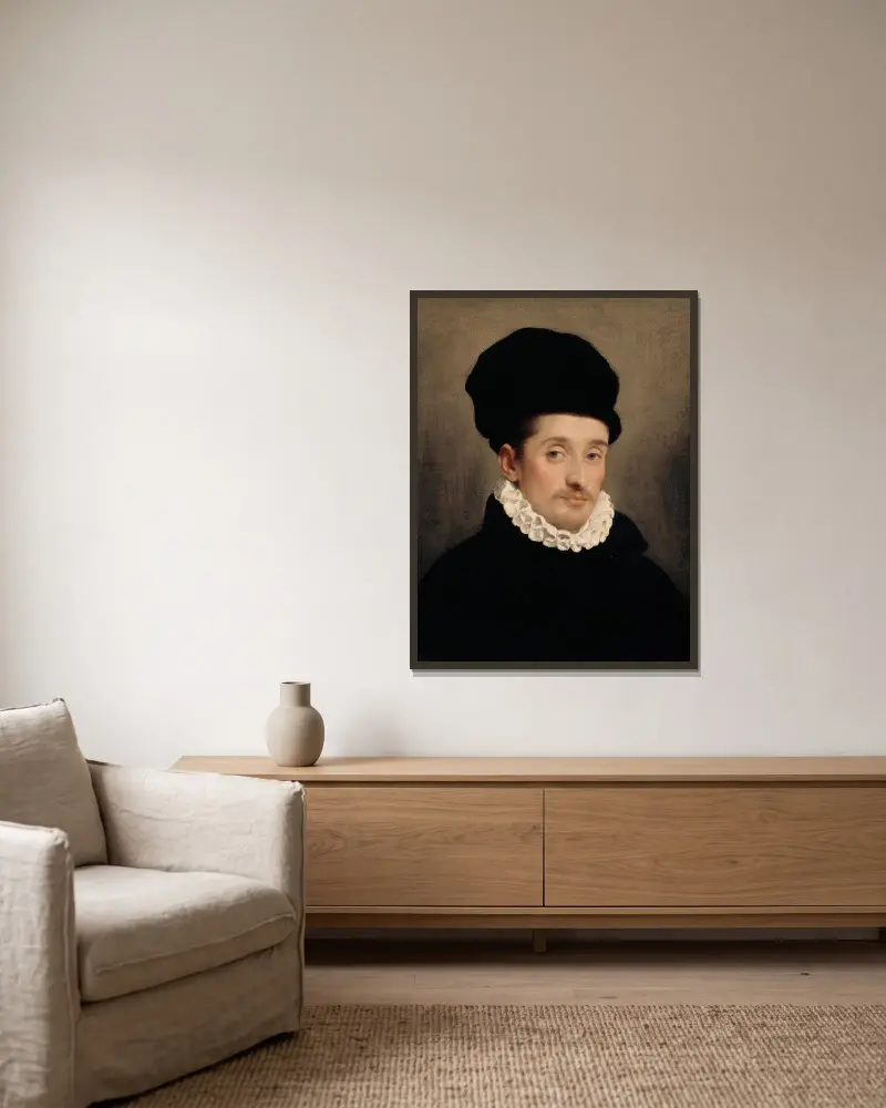 Portrait of a Man – nr 1 av Giovanni Battista Moroni inramad på en vägg