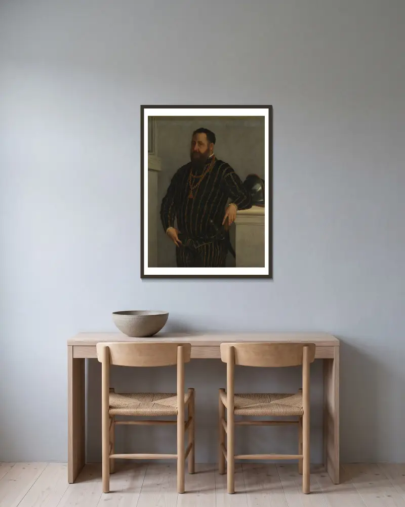Portrait of a Man – nr 2 av Giovanni Battista Moroni inramad på en vägg