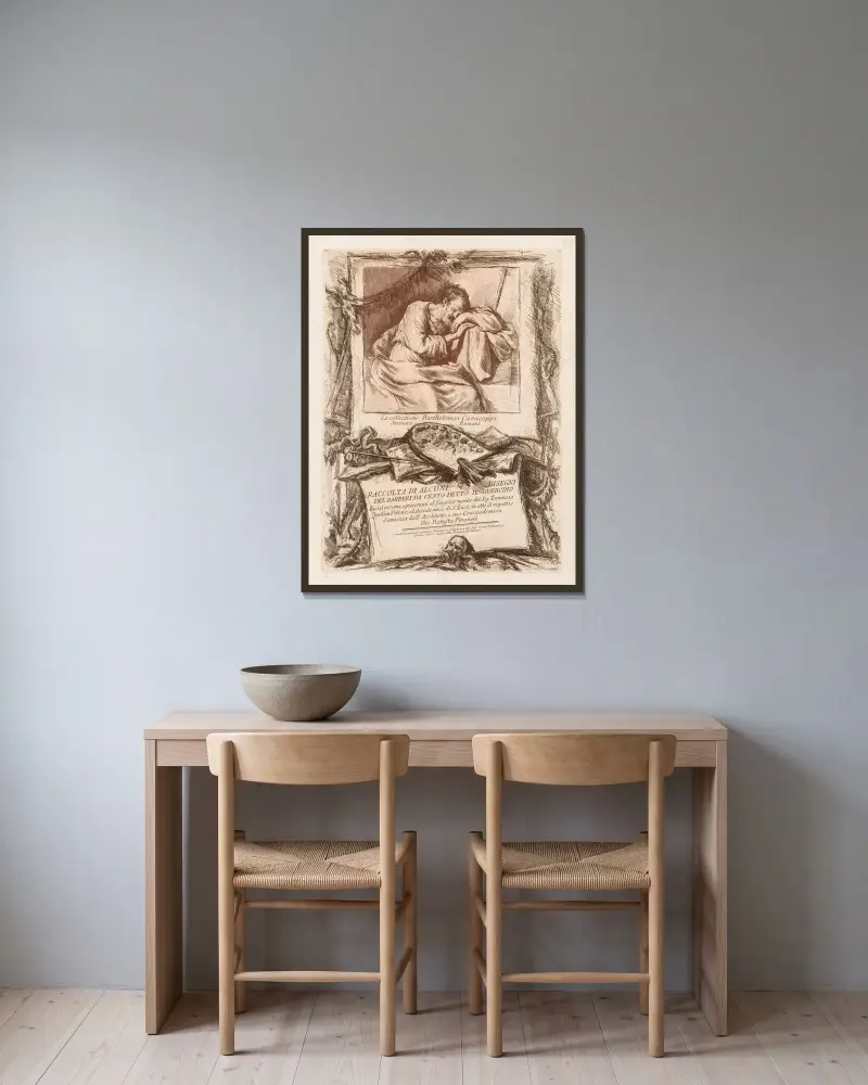 Titelsida till Raccolta di alcuni disegni del Barberi da Cento Ietto il Gerucino av Giovanni Battista Piranesi inramad på en vägg