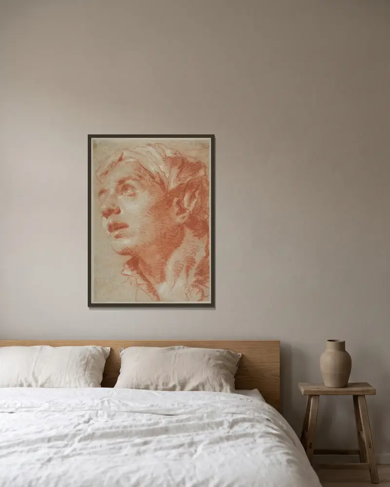 Huvud av ung man i trekvartsvy av Giovanni Battista Tiepolo inramad på en vägg