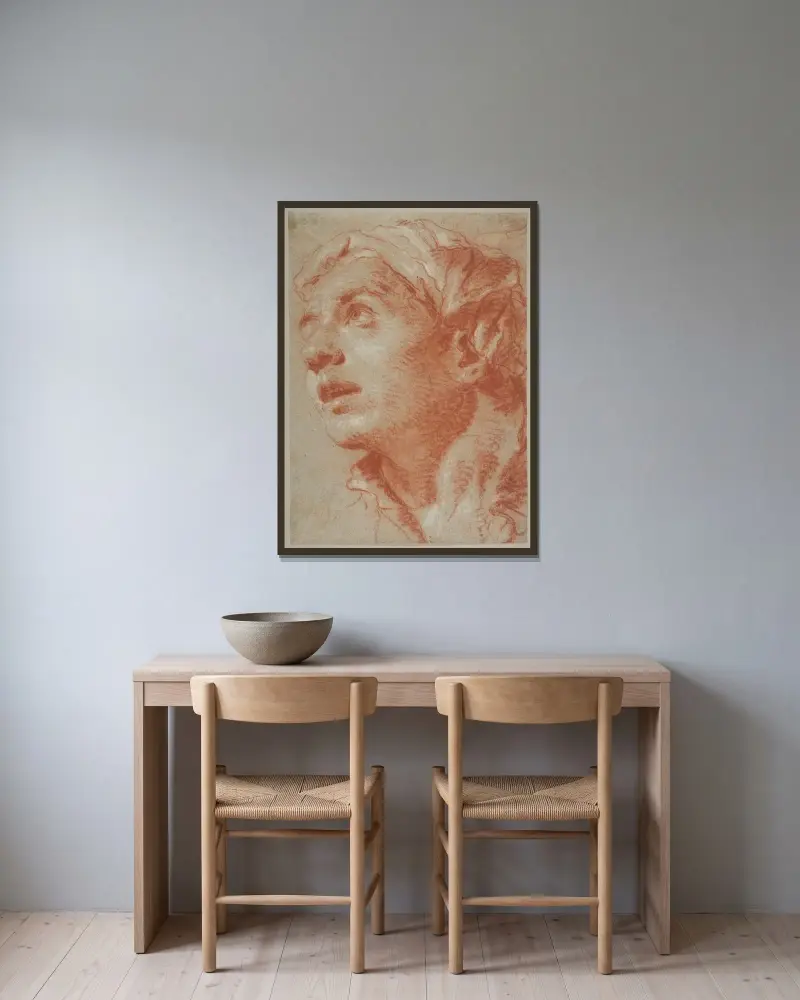 Huvud av ung man i trekvartsvy av Giovanni Battista Tiepolo inramad på en vägg