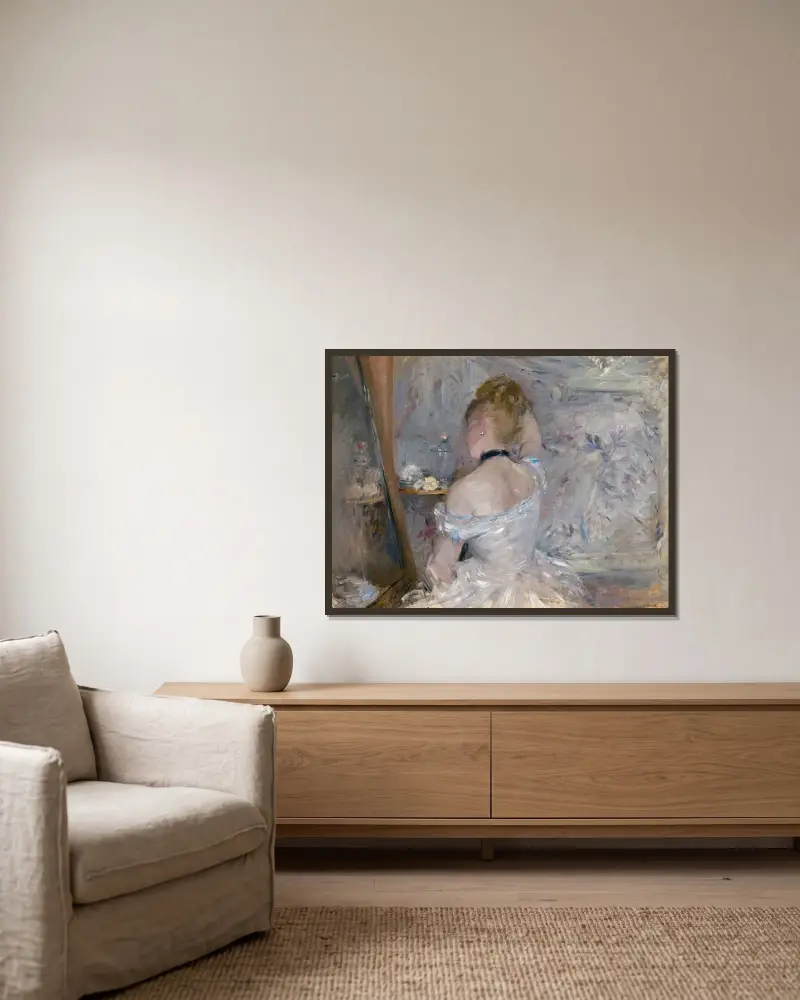 Woman at Her Toilette av Berthe Morisot inramad på en vägg