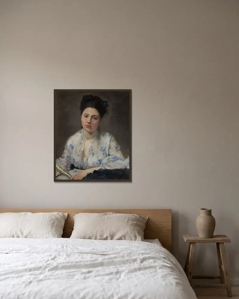 Young Woman av Berthe Morisot inramad på en vägg