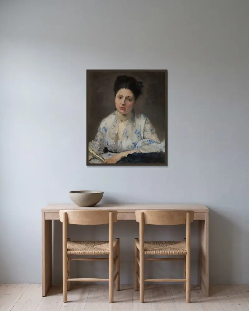 Young Woman av Berthe Morisot inramad på en vägg