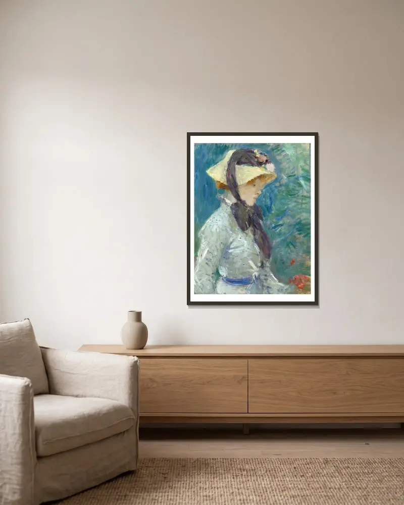 Ung kvinna med halmhatt av Berthe Morisot inramad på en vägg