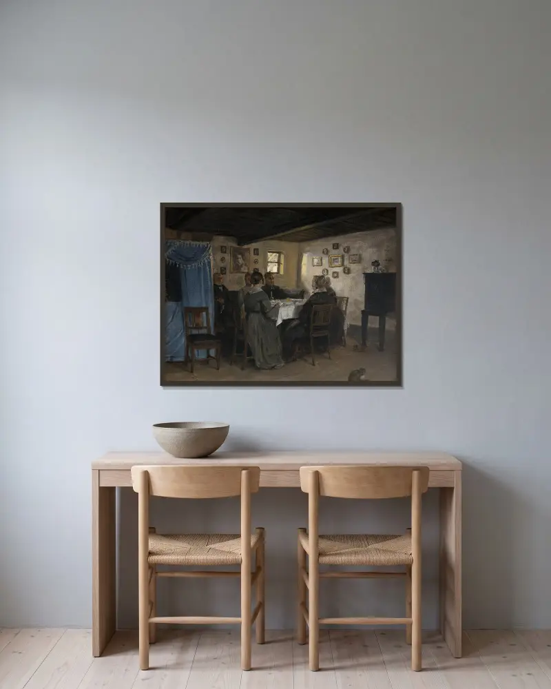 The Artist’s Friends and Family Seated Round a Table. Vejby, North Zealand av P. C. Skovgaard inramad på en vägg