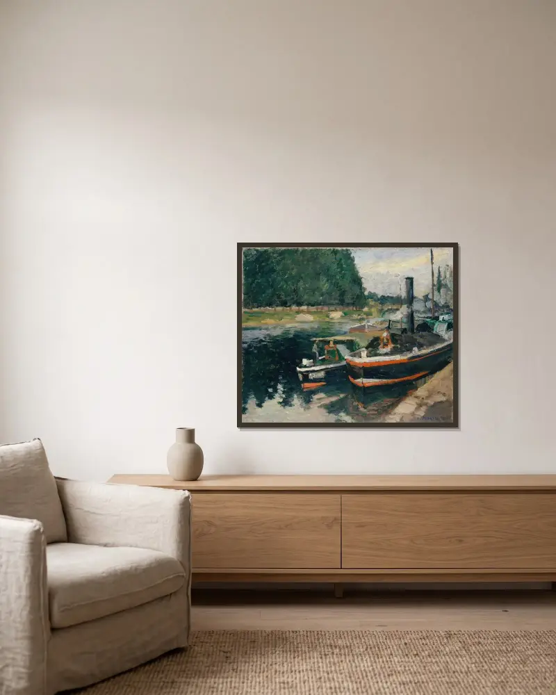 Barges at Pontoise av Camille Pissarro inramad på en vägg