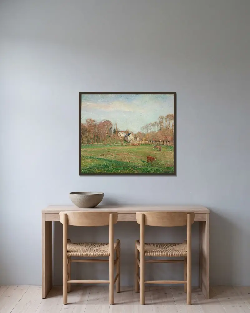 Field and Mill at Osny av Camille Pissarro inramad på en vägg