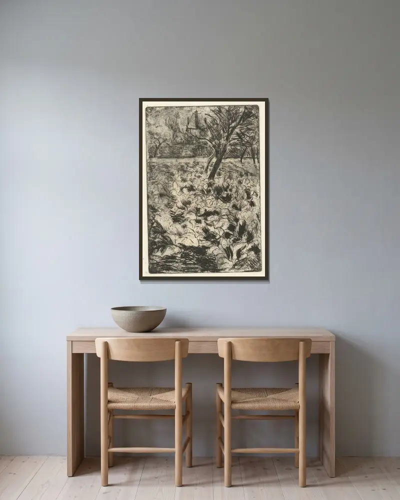 Das Knollenfeld von Camille Pissarro gerahmt an einer Wand