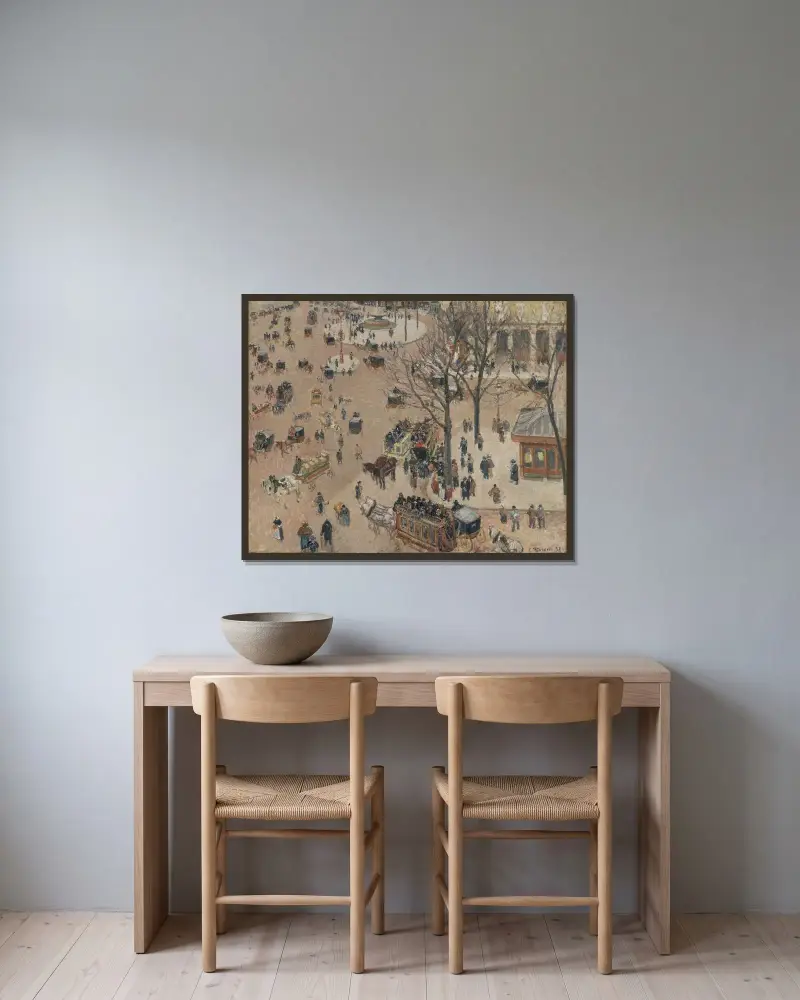 La Place du Théâtre Français av Camille Pissarro inramad på en vägg