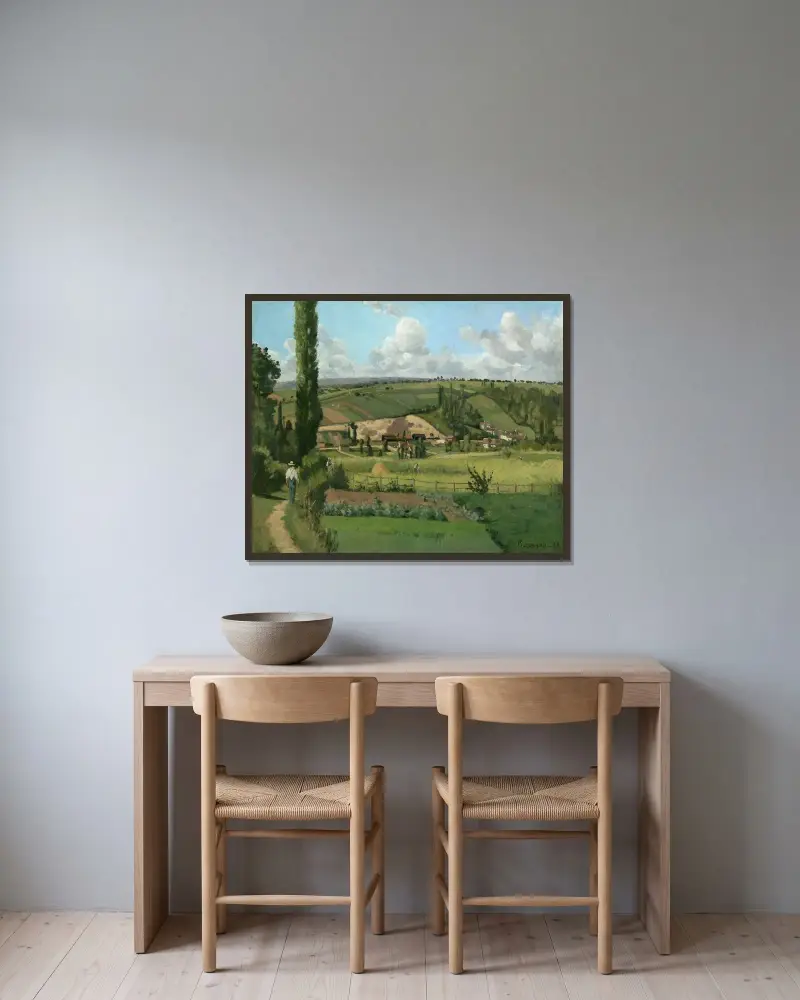 Landscape at Les Pâtis,Pontoise av Camille Pissarro inramad på en vägg