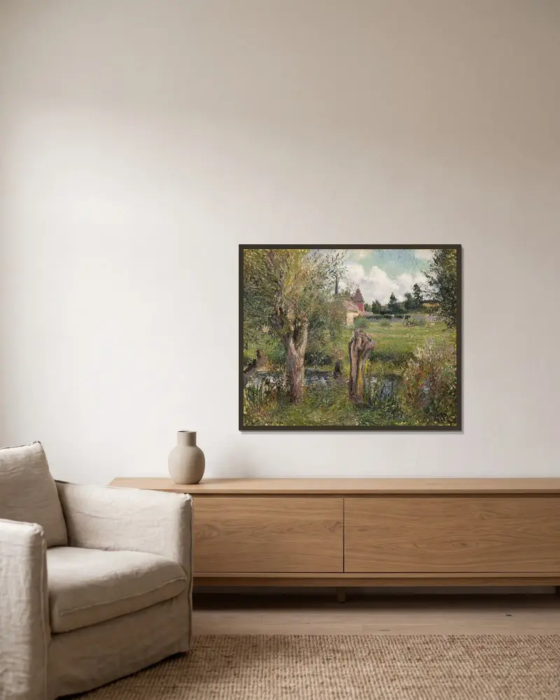 Les Bords de l’Epte à Éragny av Camille Pissarro inramad på en vägg