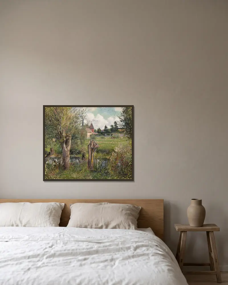 Les Bords de l’Epte à Éragny av Camille Pissarro inramad på en vägg