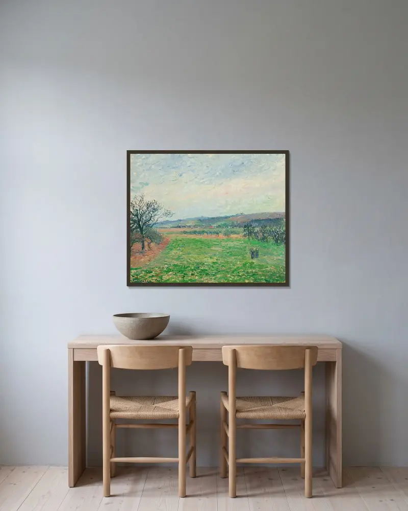 Kullarna vid Gisors i gråväder av Camille Pissarro inramad på en vägg