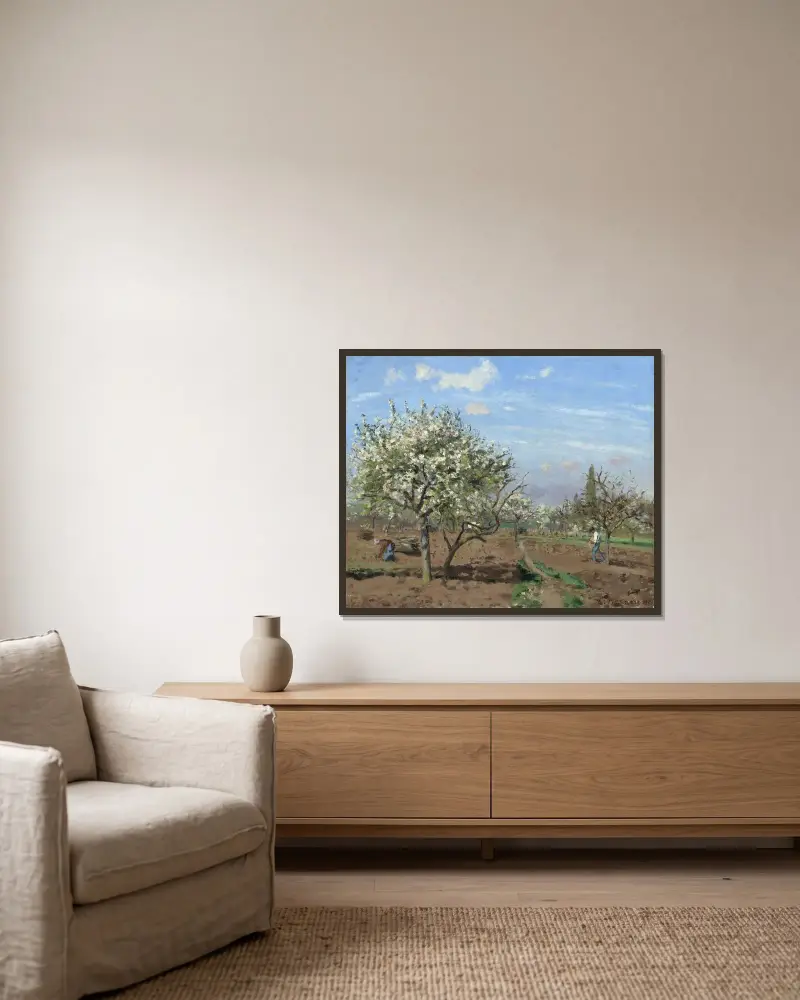 Orchard in Bloom,Louveciennes av Camille Pissarro inramad på en vägg