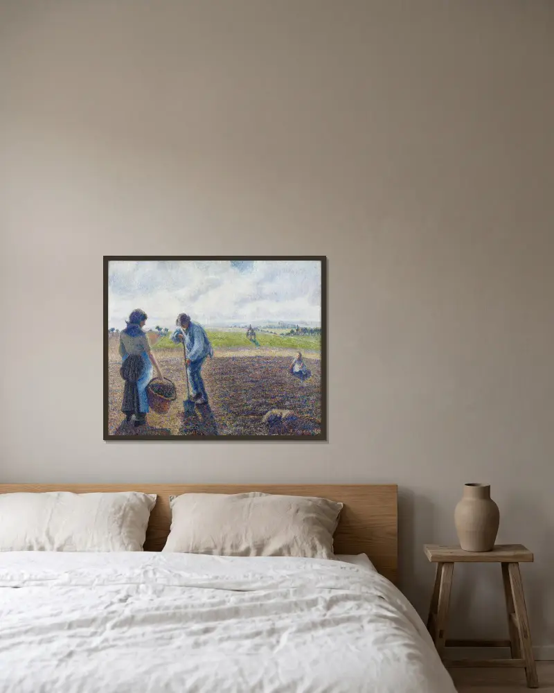 Paysans dans les champs, Éragny (Peasants in the Fields, Éragny) av Camille Pissarro inramad på en vägg