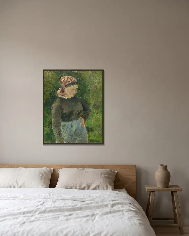 Peasant Woman av Camille Pissarro inramad på en vägg