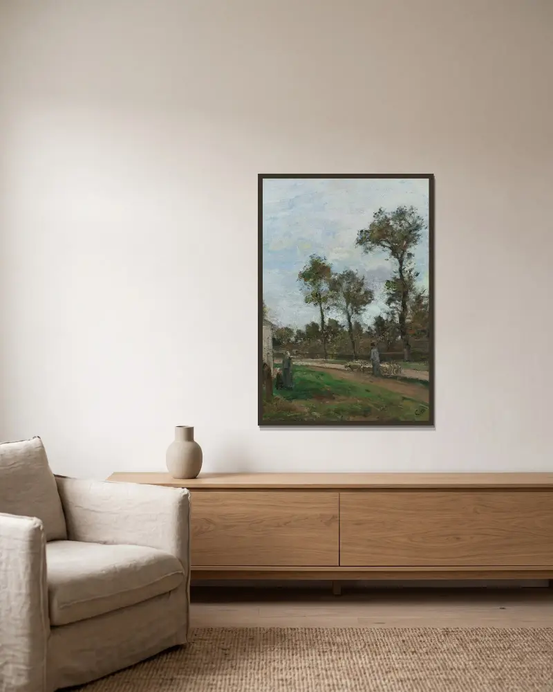 Route À Louveciennes av Camille Pissarro inramad på en vägg