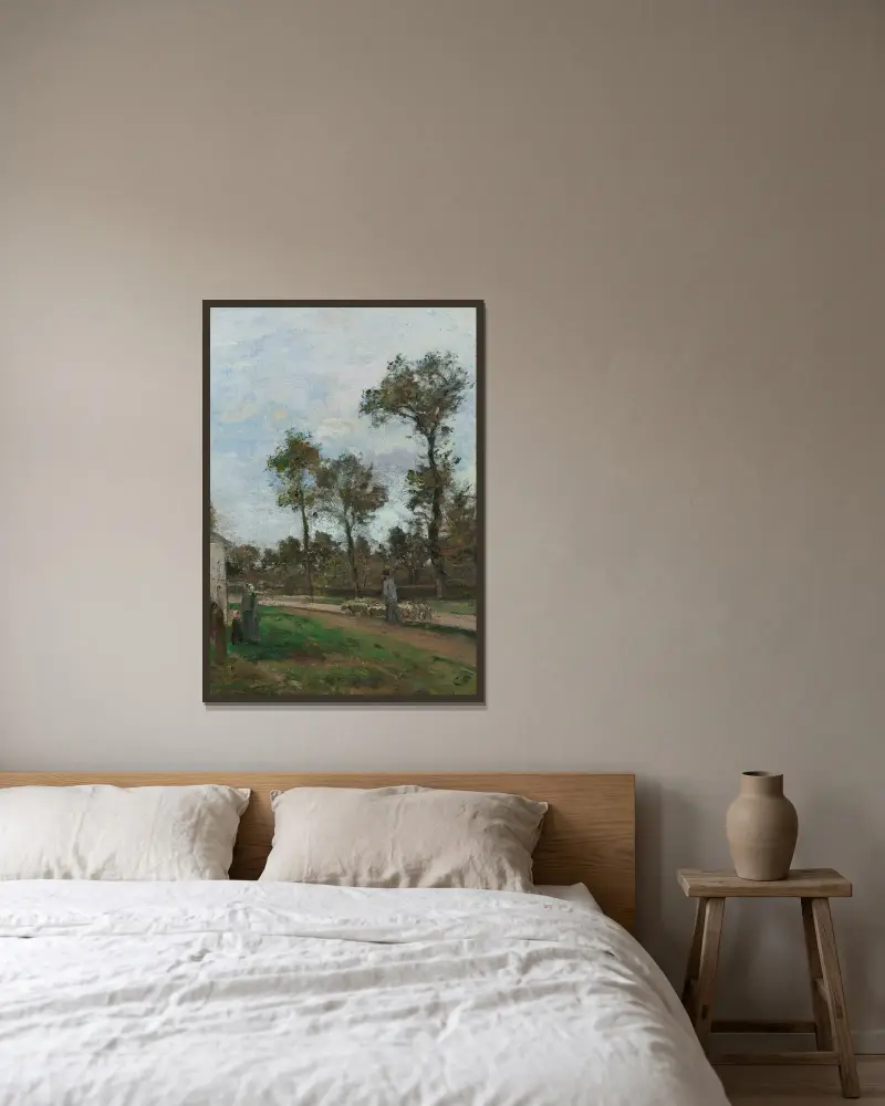 Route À Louveciennes av Camille Pissarro inramad på en vägg