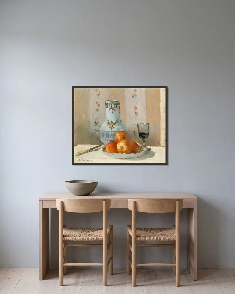 Still Life with Apples and Pitcher av Camille Pissarro inramad på en vägg
