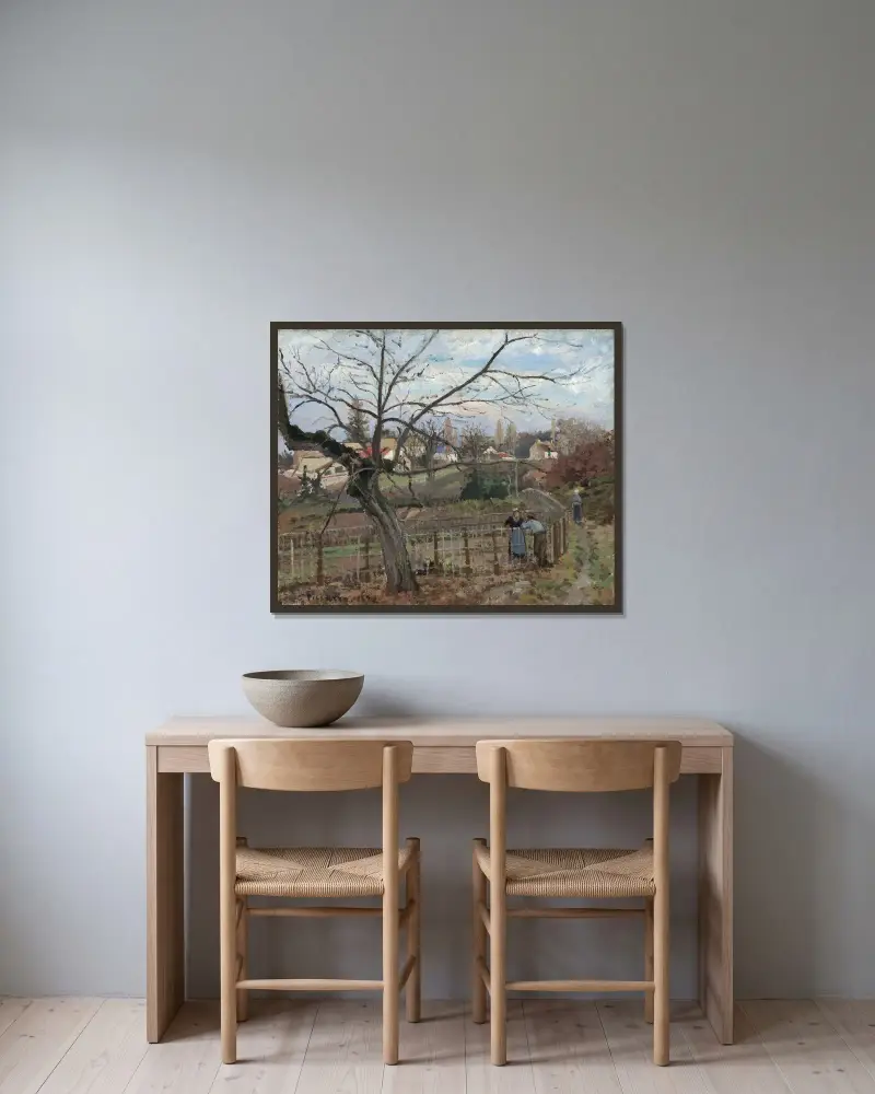 The Fence av Camille Pissarro inramad på en vägg