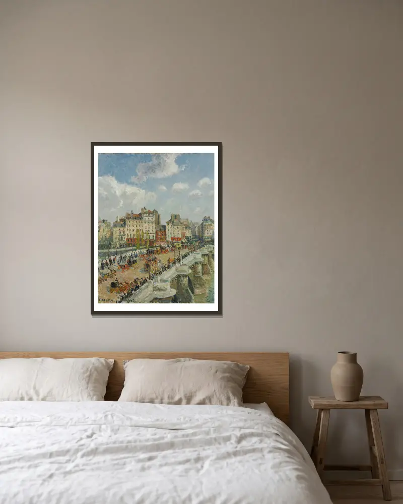 The Pont-Neuf av Camille Pissarro inramad på en vägg
