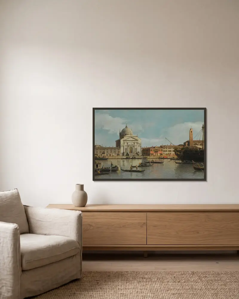 Venice, A View Of The Churches Of The Redentore And San Giacomo, With A Moored Man-Of-War, Gondolas And Barges av Canaletto inramad på en vägg