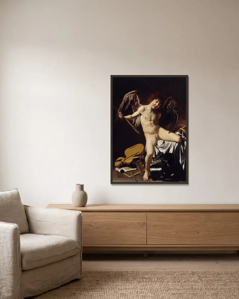 Amor Vincit Omnia von Caravaggio gerahmt an einer Wand