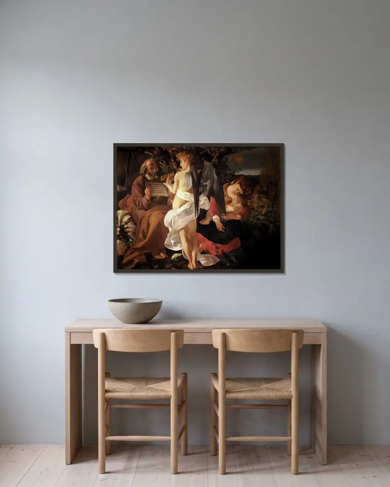 Rest on the Flight into Egypt av Caravaggio inramad på en vägg