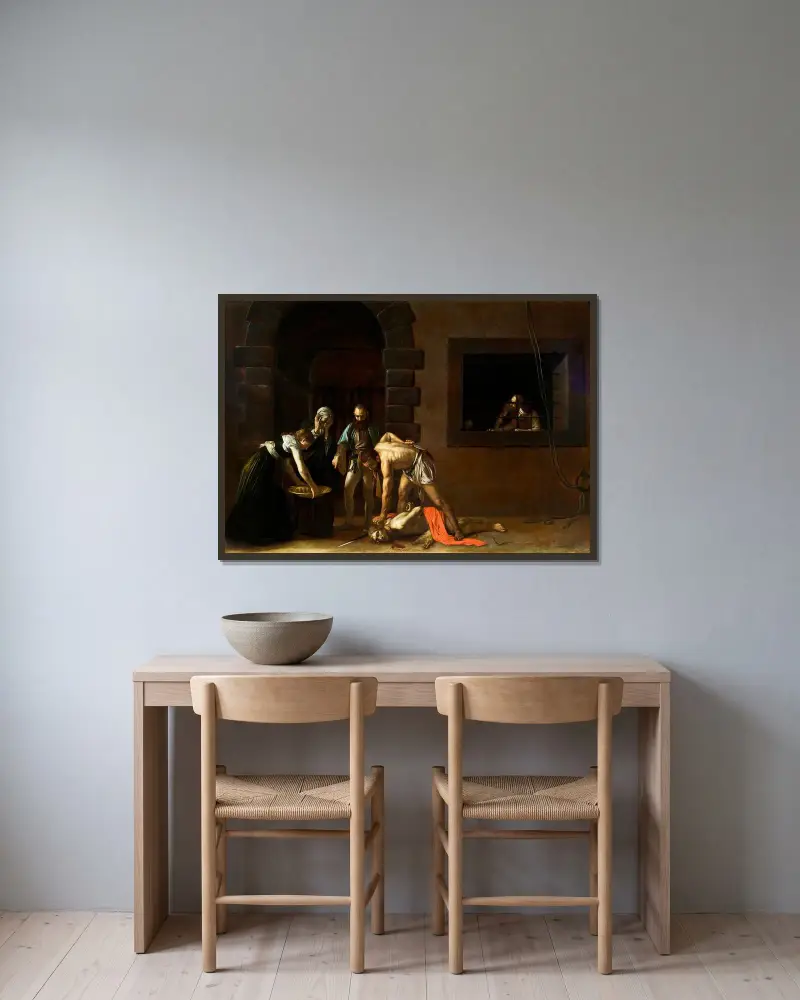 The beheading of St. John the Baptist av Caravaggio inramad på en vägg