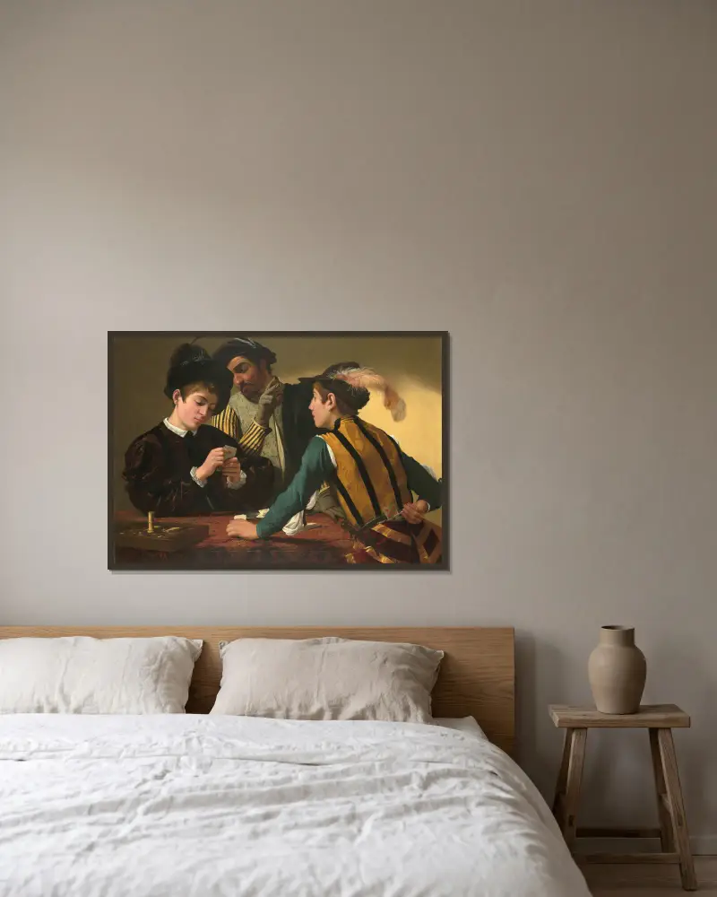Die Falschspieler von Caravaggio gerahmt an einer Wand