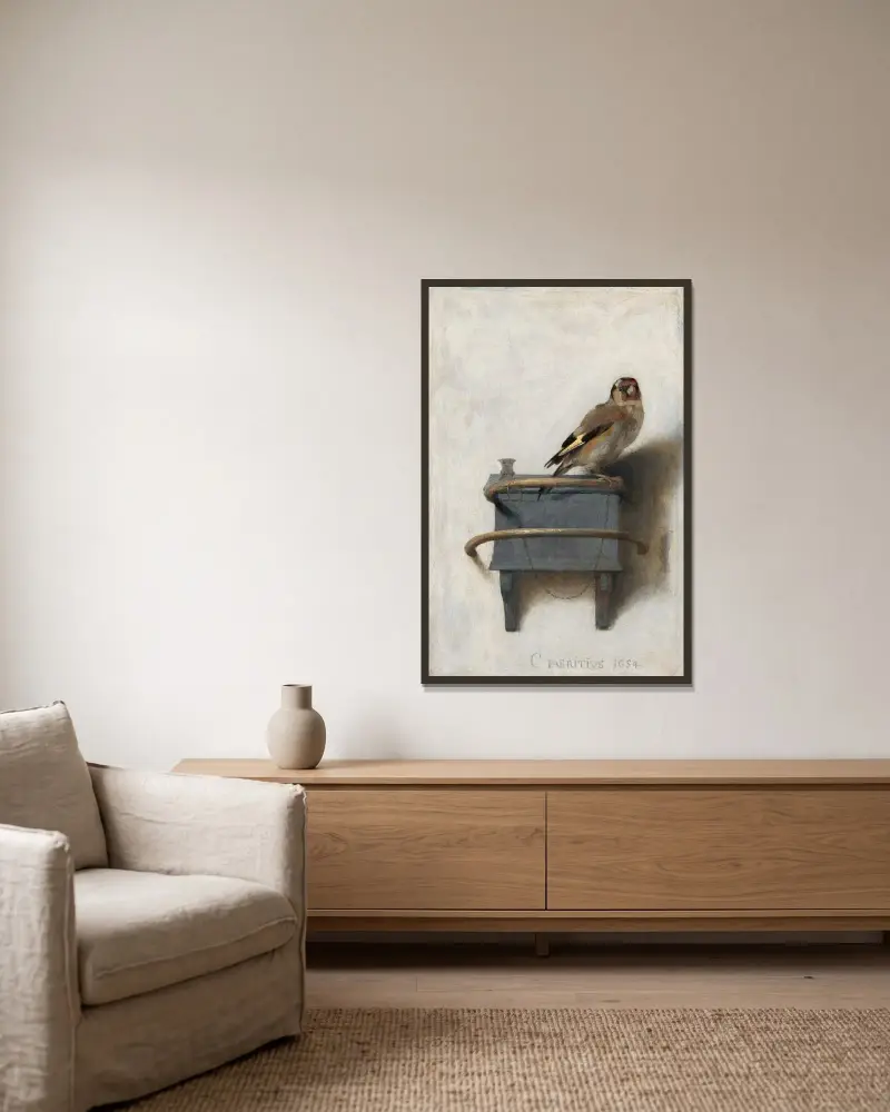 The Goldfinch av Carel Fabritius inramad på en vägg